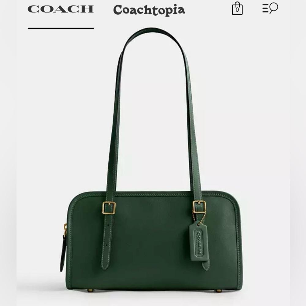 Brand new Swing Zip Coach bag still in box. Hard to find and  sold out on line.